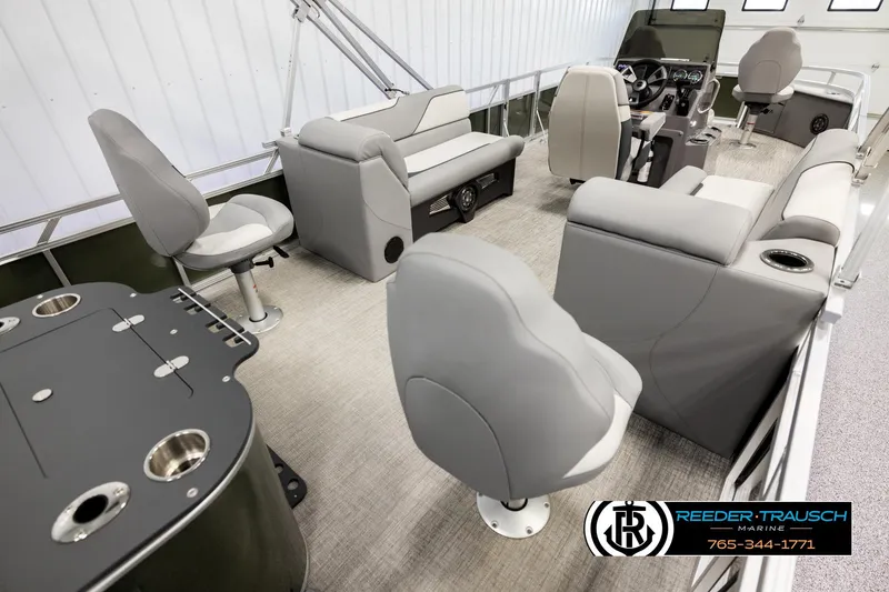 Slide: The Image of 2026 Avalon VEN85 CCF boat interior with gray seating and modern dashboard. - 12