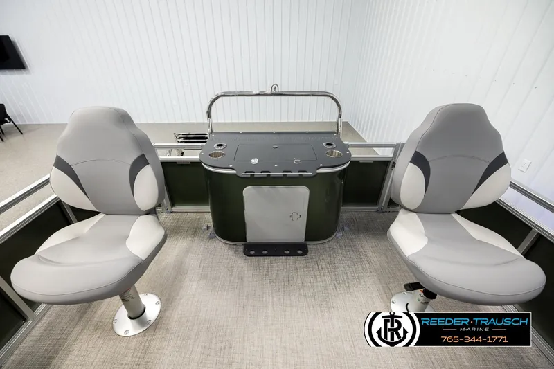 Slide: The Image of 2026 Avalon VEN85 CCF boat interior with two swivel seats and a central console. - 15