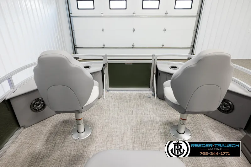Slide: The Image of 2026 Avalon VEN85 CCF boat interior with two gray seats in a garage setting. - 18