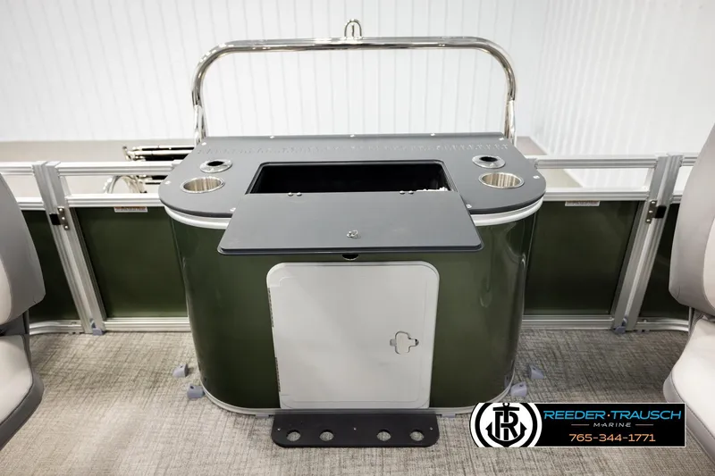 Slide: The Image of 2026 Avalon VEN85 CCF boat interior with sleek bar setup and cup holders. - 26