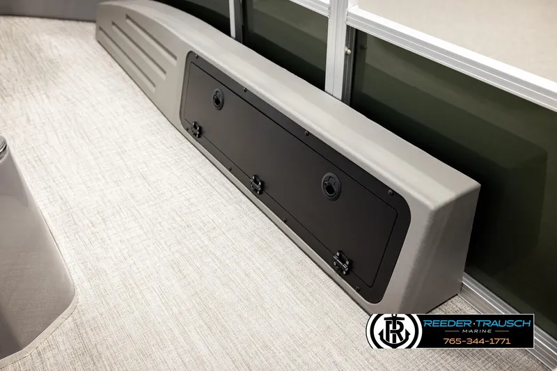 Slide: The Image of 2026 Avalon VEN85 CCF boat interior with storage compartment and Reeder-Trausch Marine logo. - 27