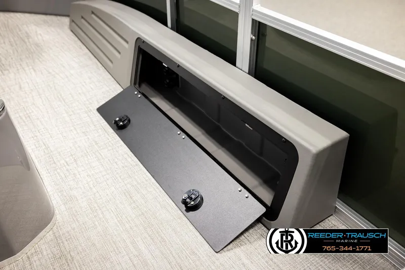 Slide: The Image of Avalon VEN85 CCF 2026 boat storage compartment with Reeder-Trausch Marine branding. - 28