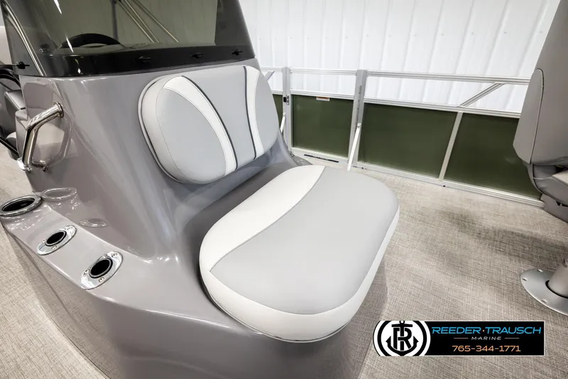 Slide: The Image of 2026 Avalon VEN85 CCF boat interior with gray and white seating, cup holders, and railing. - 29