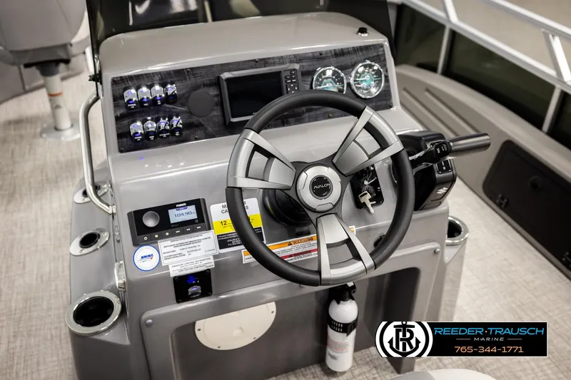 Slide: The Image of Steering console of 2026 Avalon VEN85 CCF boat with modern controls and gauges. - 32