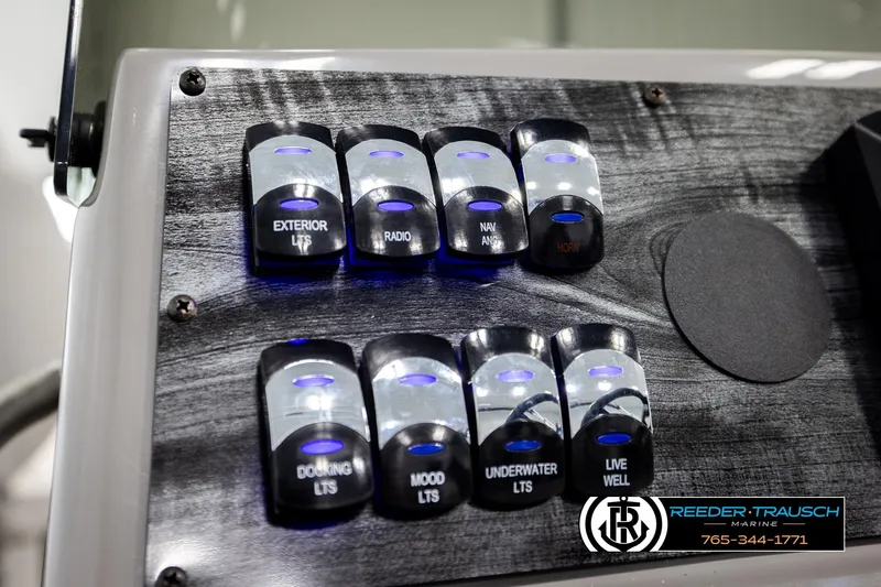 Slide: The Image of Control panel of Avalon VEN85 CCF 2026 boat with illuminated switches. - 35