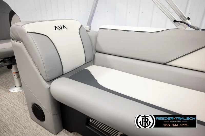 Slide: The Image of 2026 Avalon VEN85 CCF boat interior with gray and white seating, Reeder-Trausch Marine logo. - 41