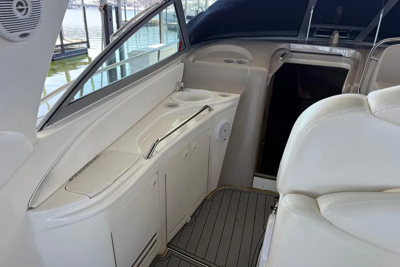 Slide: The Image of 2001 Sea Ray 340 Sundancer interior with sink and seating area. - 5