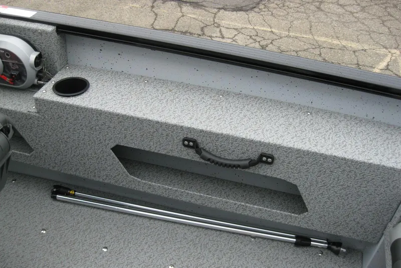 Slide: The Image of Interior of 2025 Lund 1775 Adventure SS boat with textured surface and cup holder. - 8