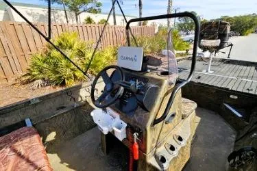 Slide: The Image of 2021 G3 Gator Tough 18 CCJ DLX boat with Garmin navigation system, camo design. - 6