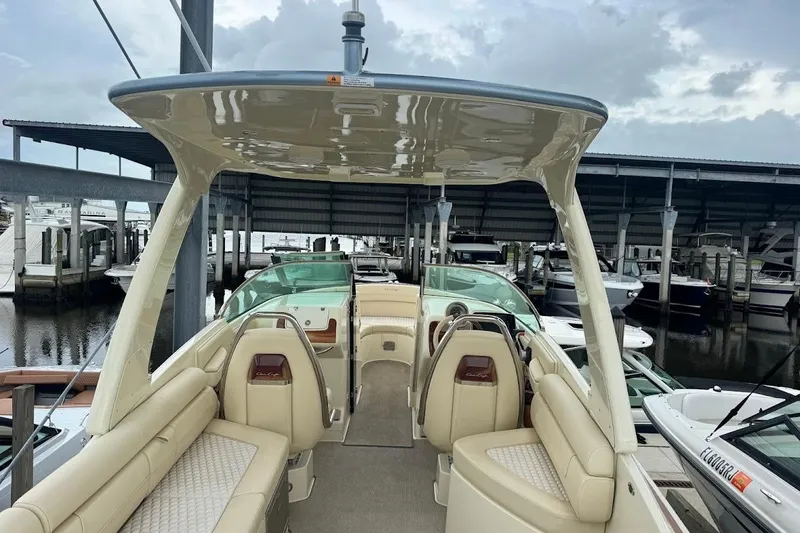 Slide: The Image of 2020 Chris-Craft Launch 28 with Yamaha outboard engine on a sunny day. - 12