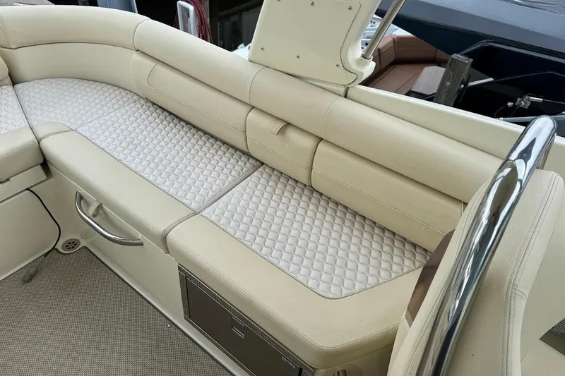 Slide: The Image of 2020 Chris-Craft Launch 28 boat with elegant wood deck and luxurious seating. - 18