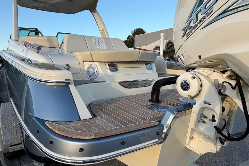 Slide: The Image of 2020 Chris-Craft Launch 28 interior with beige upholstery and speaker detail. - 31