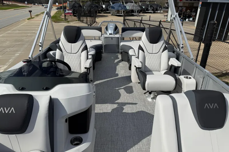 Slide: The Image of 2026 Avalon LSZ Quad Lounge Shift pontoon boat with luxurious seating and modern design. - 13