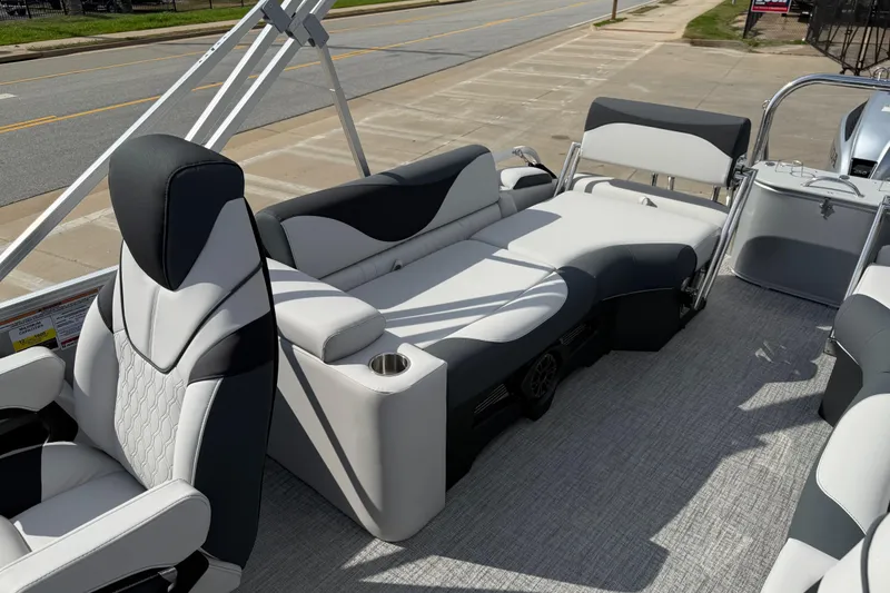 Slide: The Image of 2026 Avalon LSZ Quad Lounge Shift boat interior with luxurious seating and modern design. - 16