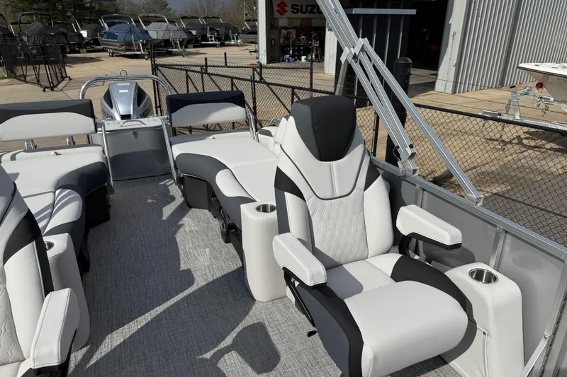 Slide: The Image of 2026 Avalon LSZ Quad Lounge Shift pontoon boat interior with luxurious seating. - 17