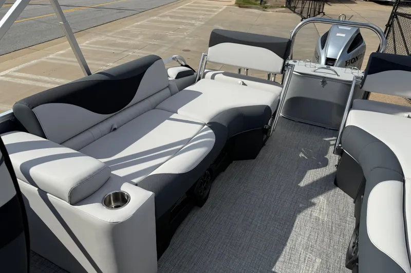 Slide: The Image of 2026 Avalon LSZ Quad Lounge Shift pontoon boat interior with plush seating and modern design. - 19