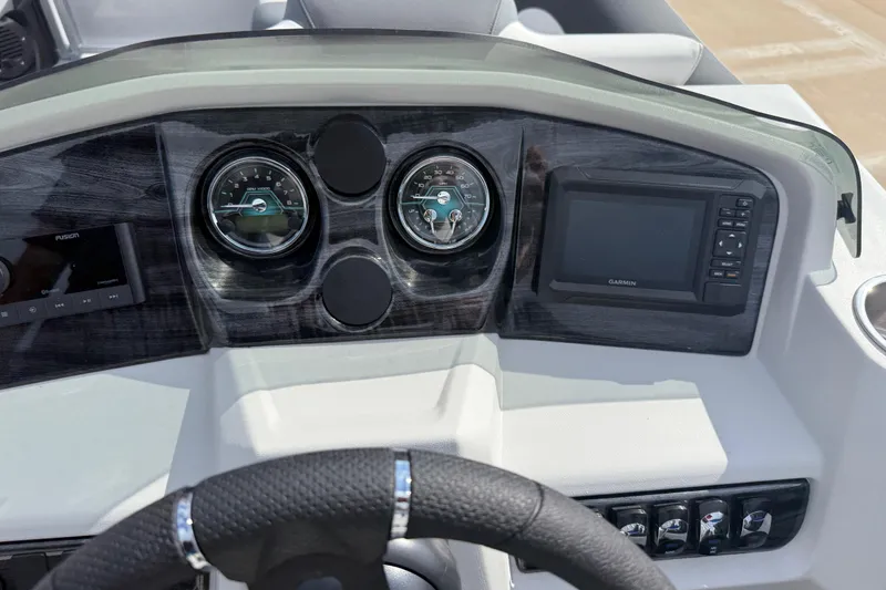 Slide: The Image of Dashboard of 2026 Avalon LSZ Quad Lounge Shift with gauges and Garmin display. - 22