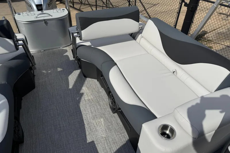Slide: The Image of 2026 Avalon LSZ Quad Lounge Shift boat interior with gray and white seating. - 28