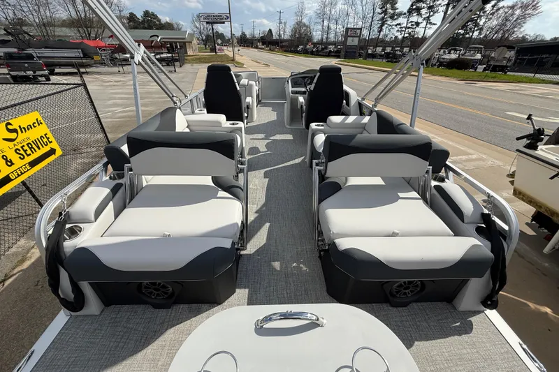 Slide: The Image of 2026 Avalon LSZ Quad Lounge Shift pontoon boat with spacious seating and modern design. - 32