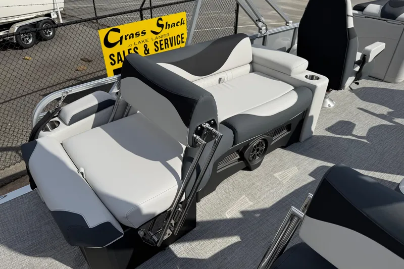 Slide: The Image of 2026 Avalon LSZ Quad Lounge Shift boat interior with luxurious seating and modern design. - 34