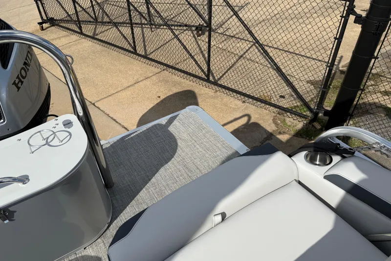 Slide: The Image of 2026 Avalon LSZ Quad Lounge Shift boat deck with seating and Honda engine. - 35