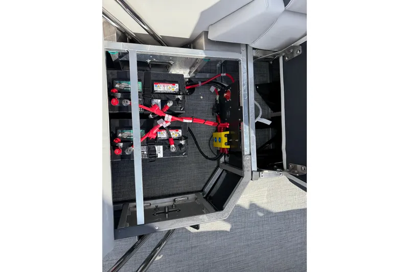 Slide: The Image of 2026 Avalon LSZ Quad Lounge Shift battery compartment with wiring and connections. - 39