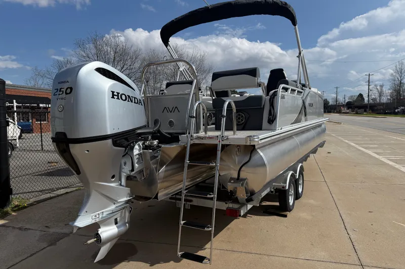 Slide: The Image of 2026 Avalon LSZ Quad Lounge Shift pontoon boat with Honda 250 VTEC engine. - 7