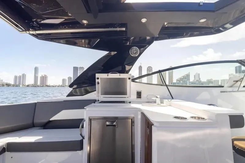 Slide: The Image of 2021 Cruisers Yachts 38 GLS OB interior with city skyline view. - 16