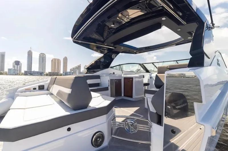 Slide: The Image of 2021 Cruisers Yachts 38 GLS OB interior with city skyline in background. - 13