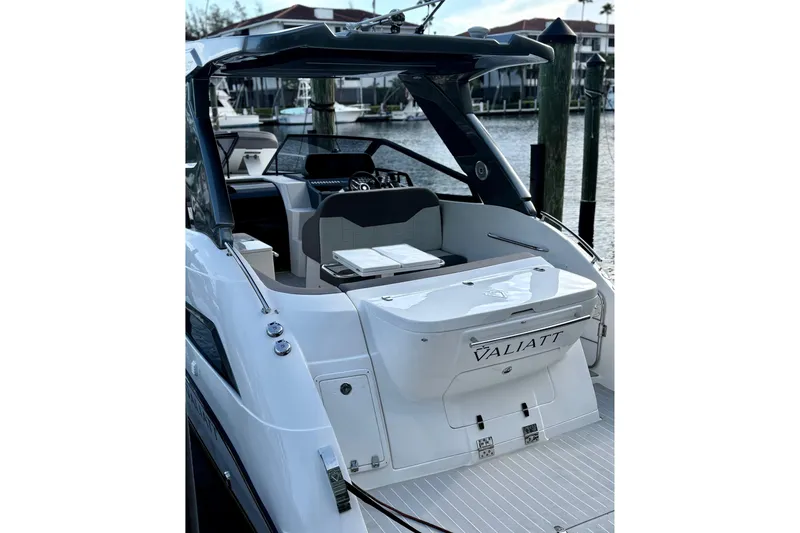 Slide: The Image of 2025 Valiatt 350GT luxury yacht docked at marina, showcasing sleek design and modern features. - 10