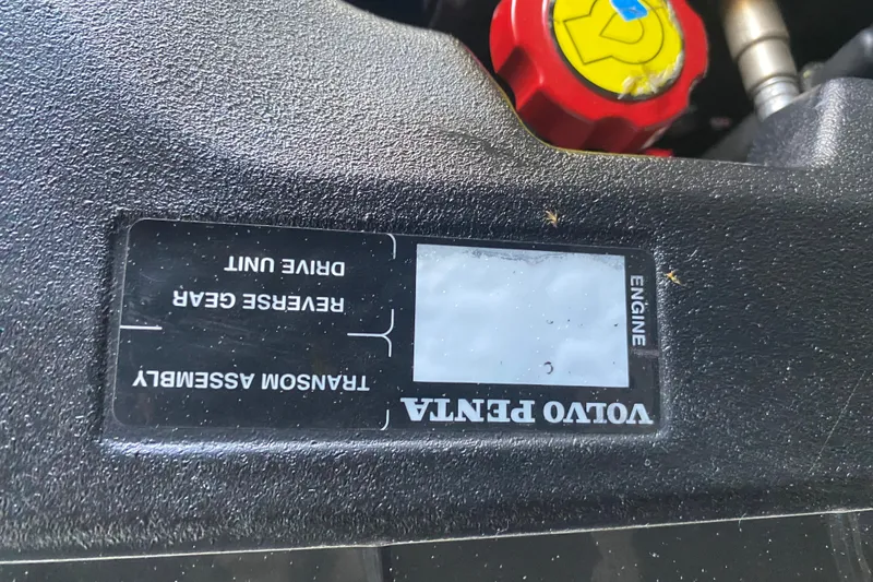 Slide: The Image of Close-up of Volvo Penta engine label on 2012 Bennington 2575 QCW I/O boat. - 24