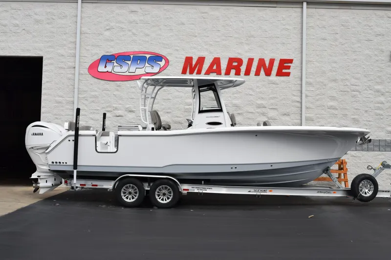 The Image of 2026 Sea Hunt Ultra 285 SE boat on trailer at GSPS Marine dealership. - 1