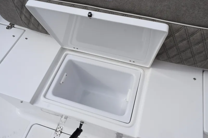 Slide: The Image of Open storage compartment on 2026 Sea Hunt Ultra 285 SE boat. - 20