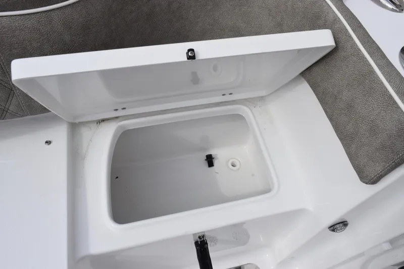 Slide: The Image of Open storage compartment on 2026 Sea Hunt Ultra 285 SE boat. - 21