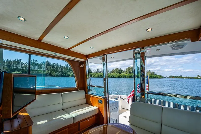 Slide: The Image of Interior of 2016 Sabre 42 Salon Express yacht with scenic water view. - 18