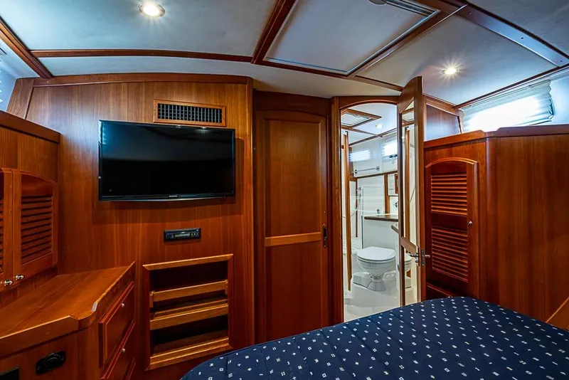 Slide: The Image of Luxurious interior of 2016 Sabre 42 Salon Express yacht with wood paneling and modern amenities. - 34