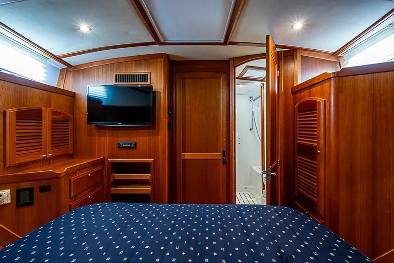 Slide: The Image of Luxurious interior of 2016 Sabre 42 Salon Express yacht with wood finish and modern amenities. - 36
