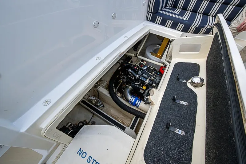 Slide: The Image of Engine compartment of 2016 Sabre 42 Salon Express yacht, showcasing mechanical components. - 45