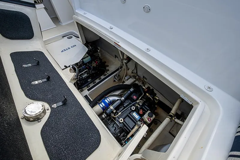 Slide: The Image of Engine compartment of 2016 Sabre 42 Salon Express yacht, showcasing mechanical components. - 46