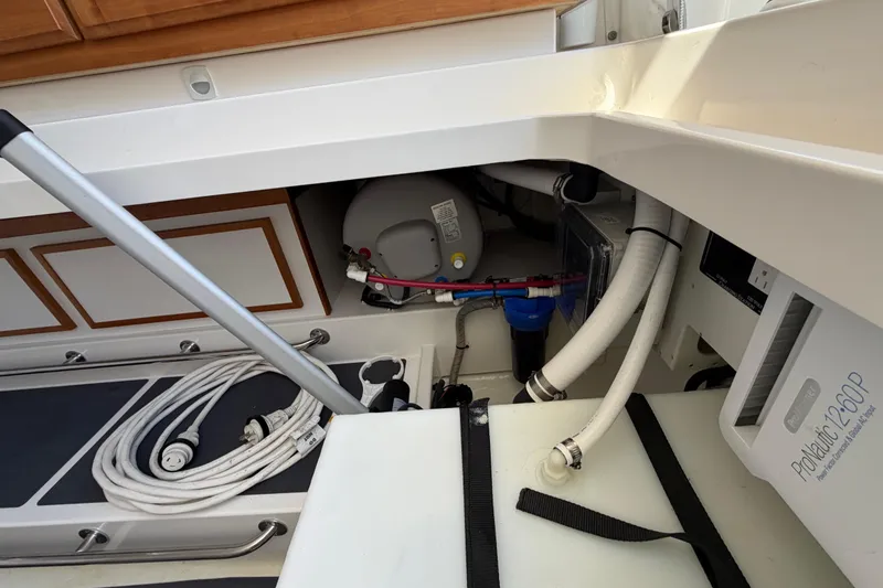 Slide: The Image of 2023 Back Cove 340 boat interior showing storage and equipment compartments. - 39