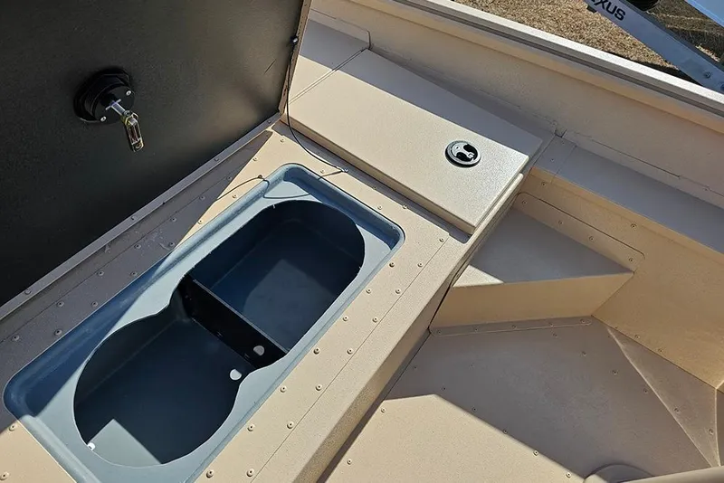 Slide: The Image of 2026 G3 Bay 17 boat interior with storage compartment and latch. - 12