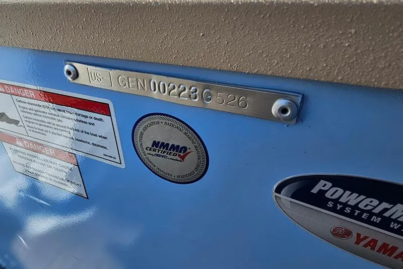 Slide: The Image of 2026 G3 Bay 17 boat with certification and warning labels. - 16