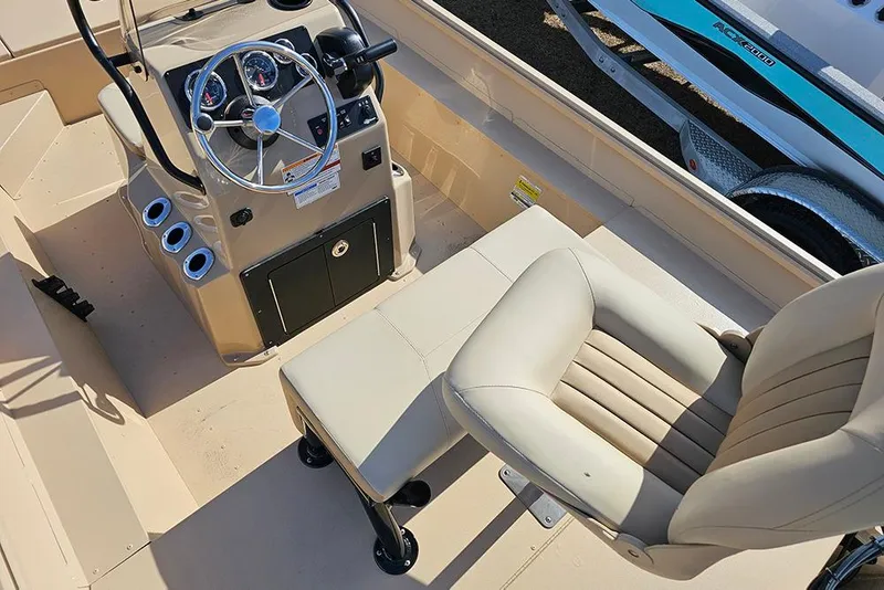 Slide: The Image of Interior of 2026 G3 Bay 17 boat with steering console and seating. - 8