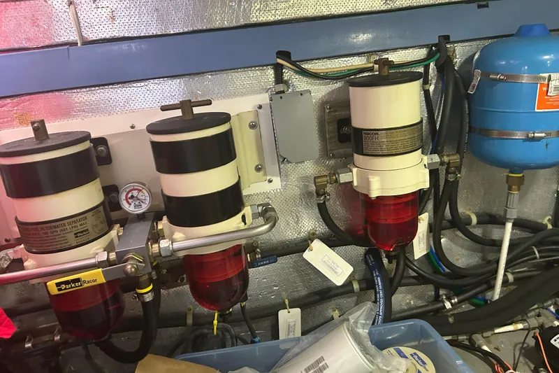 Slide: The Image of Engine room of 2006 Mariner Orient with fuel filters and water separator system. - 23