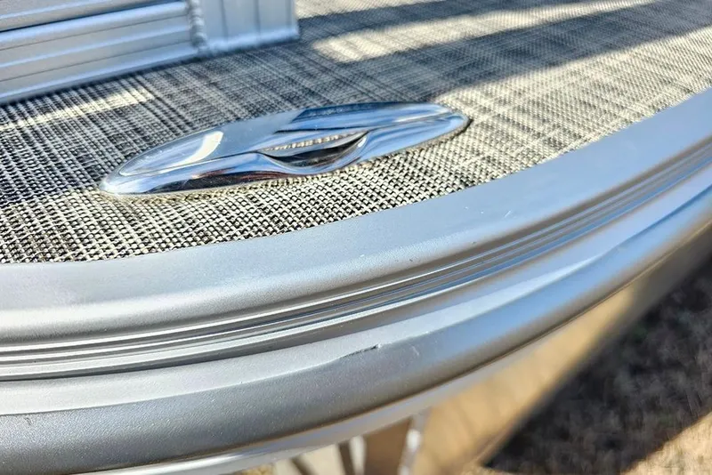 Slide: The Image of Close-up of 2026 SunCatcher Select 20C boat detail with sleek metallic finish. - 26