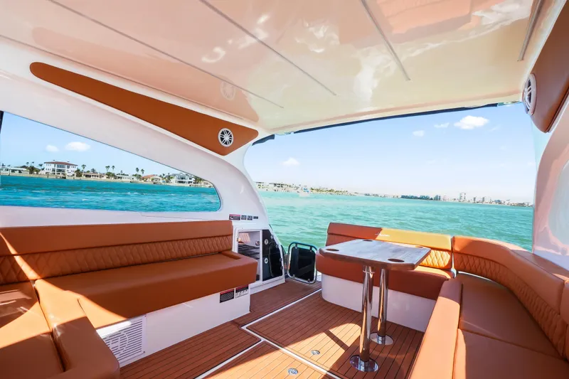 Slide: The Image of Luxurious interior of 2026 Hanover 355 boat with ocean view and elegant seating. - 13