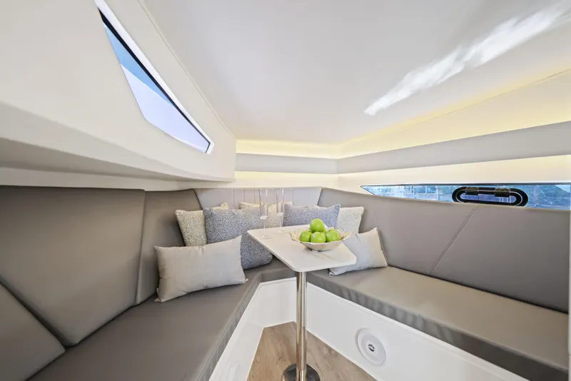 Slide: The Image of Luxurious interior of 2025 Valiatt 380 Bowrider with elegant seating and table. - 20