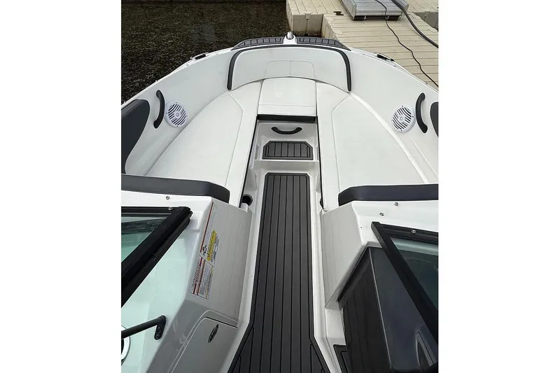 Slide: The Image of 2018 Sea Ray SPX 210 boat interior with sleek seating and modern design. - 5