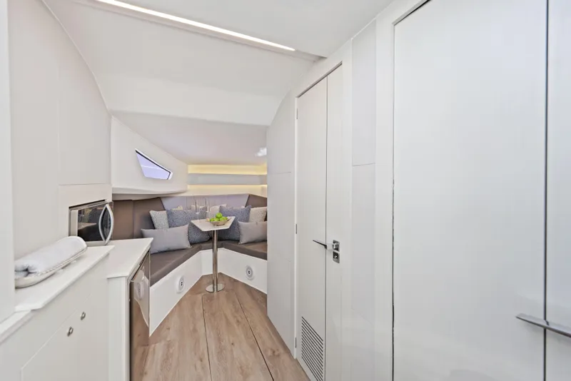 Slide: The Image of Interior of 2025 Valiatt 380 Bowrider, featuring modern seating and sleek design elements. - 22
