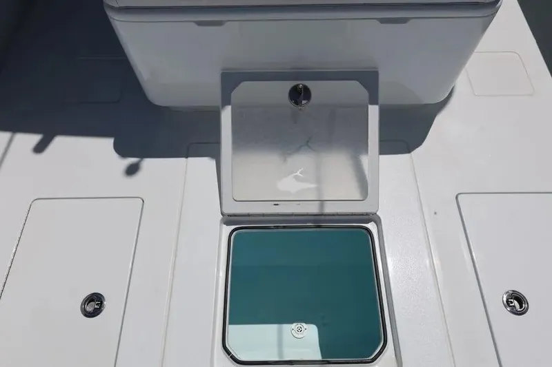 Slide: The Image of 2025 Contender 39 ST boat deck with storage compartments and livewell. - 15